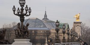 Bridge building people post statue