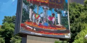 billboard carousel City commercial sidewalk unicorn