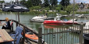 Boats flag kayak tree water
