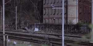 train railroad graffiti europe apartment building rain