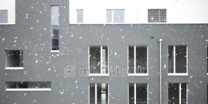 Winter Apartment building gray snow white window